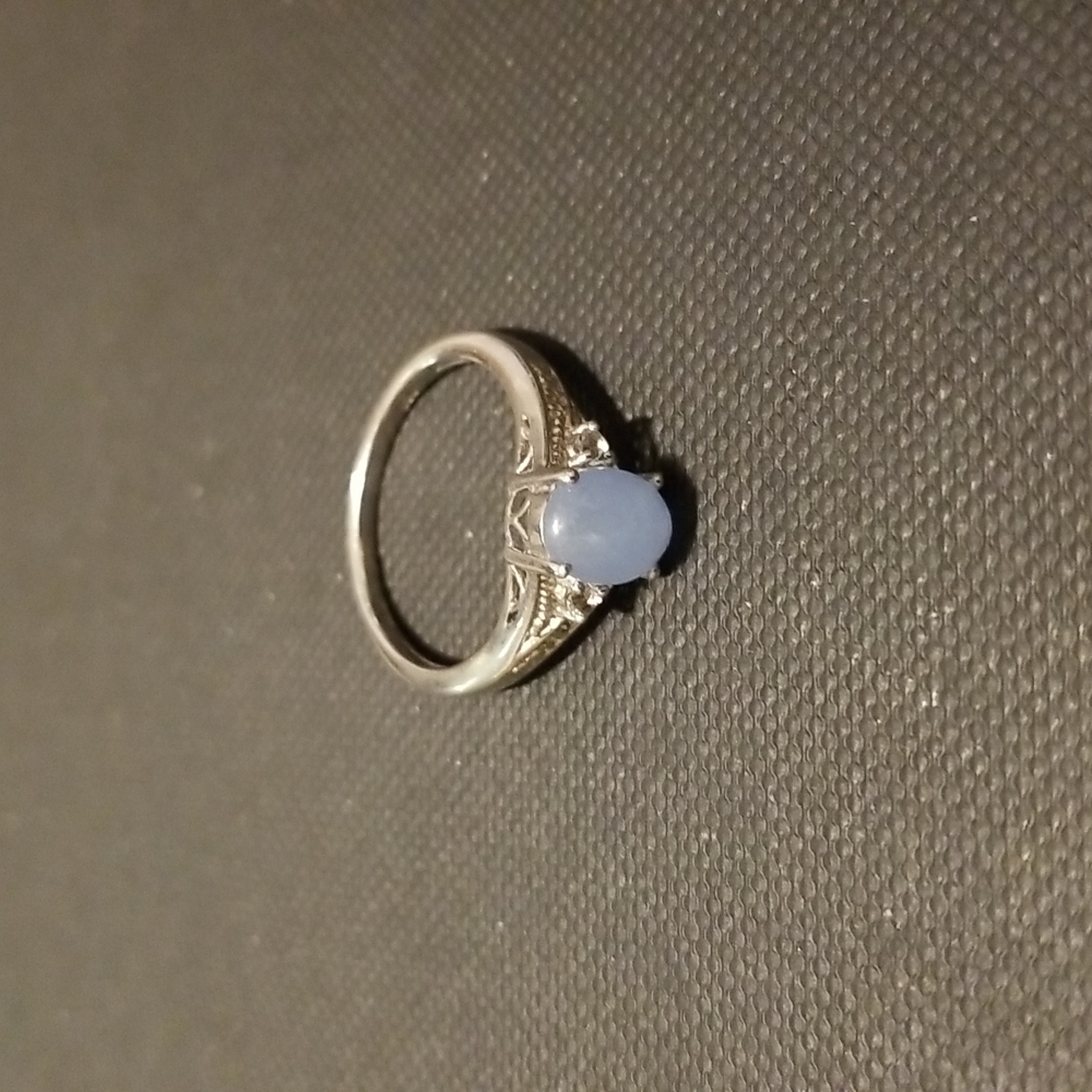 Sterling silver ring with light blue stone
